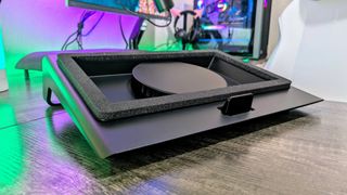 The Razer Laptop Cooling Pad on a desk, showing the fan and magnetic frame.